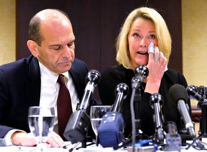 Former Boston news anchor Heather Unruh sits with her attorney Mitchell Garabedian at a press conference in Boston November 8, 2017.