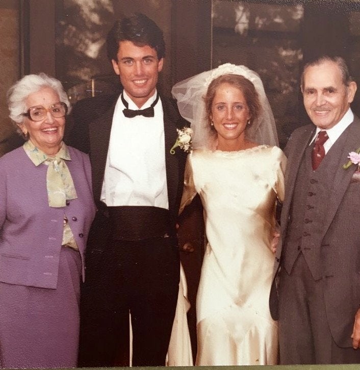 Marta Prietto O'Hara with her grandma Maria Teresa (a.k.a Grande) and grandpa Manuel Moreno. In addition to the wedding dress, Grande (left) made the suit and blouse she is wearing in this photo.