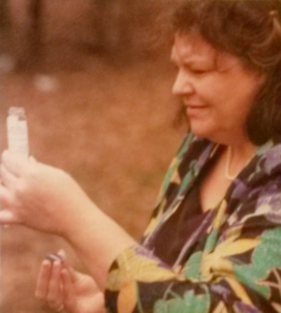 <em>Kaye Kiker taking groundwater samples from an artesian well next to the CWM toxic waste dump in Sumter County, AL in 1990