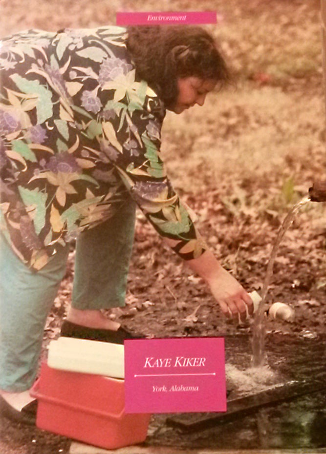 <em>Kaye Kiker taking groundwater samples from an artesian well next to the CWM toxic waste dump in Sumter County, AL in 1990
