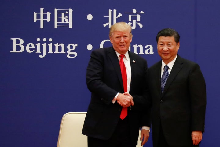 President Donald Trump and China's President Xi Jinping met with business leaders at the Great Hall of the People in Beijing on Thursday.