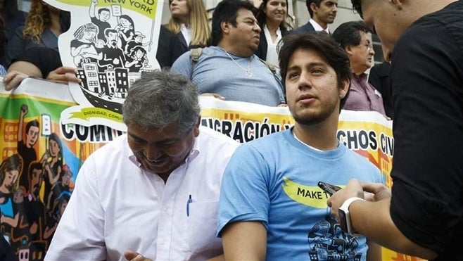 <p>Martin Batalla Vidal, front right, arrives for a rally of legal and civil rights groups in New York before going to court to challenge President <a href="https://www.huffpost.com/news/topic/donald-trump">Donald Trump</a>'s plan to phase out a program shielding young immigrants from deportation. Many immigrants appear in immigration court without an attorney, but a number of cities and states are creating legal defense funds to help them.</p>
