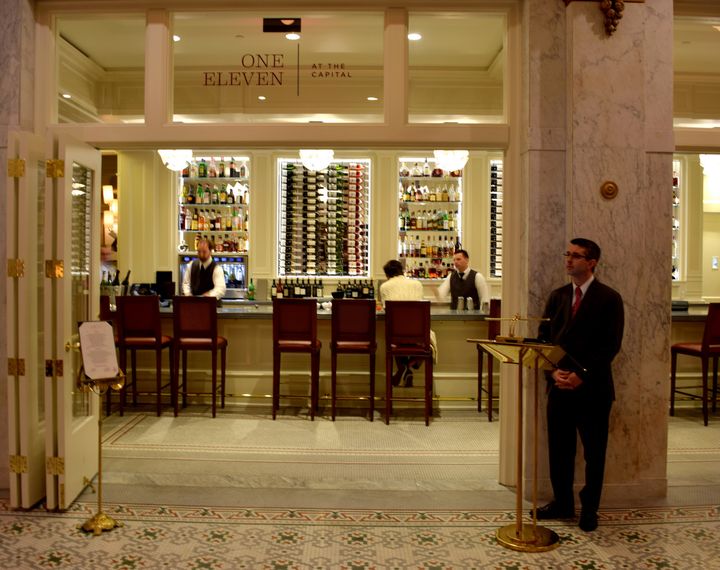 <p>entrance to One Eleven Restaurant at The Capital Hotel</p>