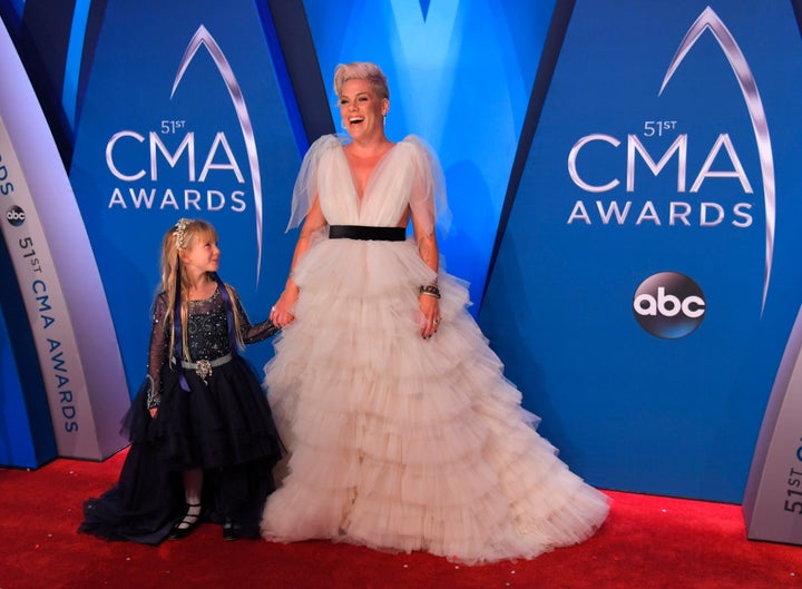 Pink attended the CMA Awards to promote her new album, “Beautiful Trauma” and perform her song “Barbies” as the featured pop-star guest. 