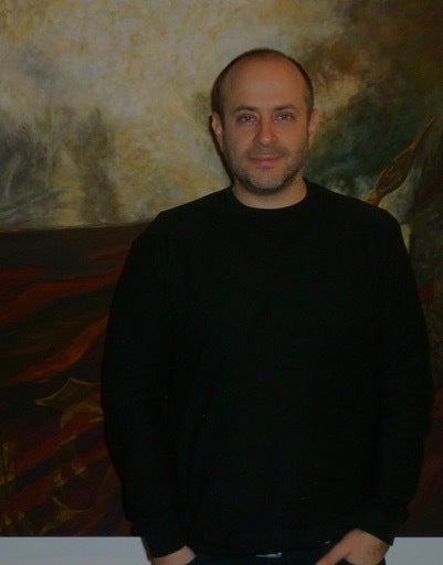 Yevgeniy Fiks in front of his painting “Leniniana No. 1,” quoting the famous 1929 portrait of Lenin by Gerasimov—without Leni