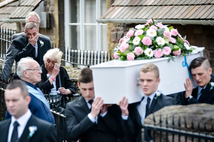 Father Darren Galsworthy with stepmother Anjie Galsworthy follow Becky's coffin during her funeral in 2015
