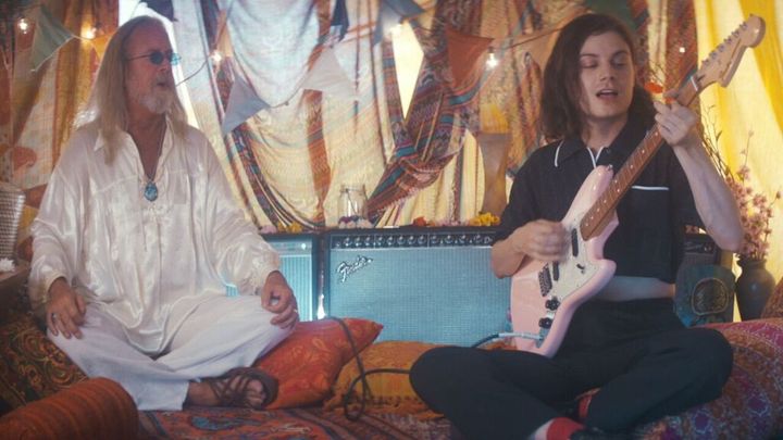 Børns playing his Fender Shell Pink Offset Mustang as part of his recent collaboration with the guitar company