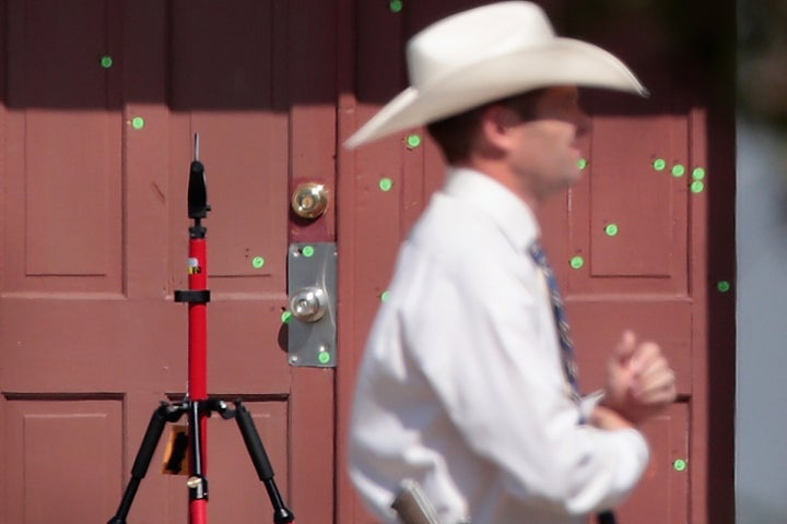 The front door of the First Baptist Church of Sutherland Springs is seen ridden with bullet holes following the Nov. 5 shooting.