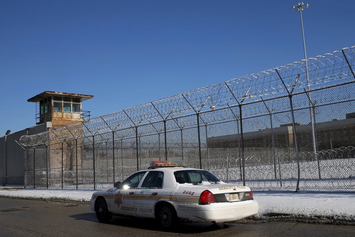 A Cook County Sheriff's police car patrols the exterior of the Cook County Jail in Chicago on Jan. 12, 2016. 