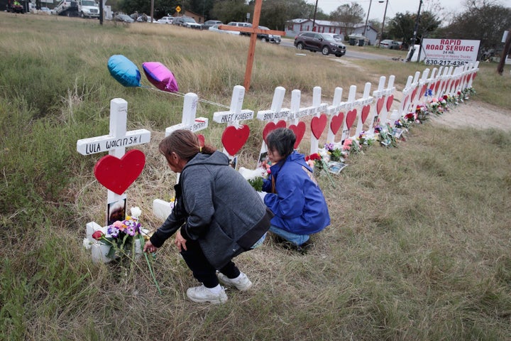 Visitors leave flowers at a memorial for the 26 people killed at the First Baptist Church of Sutherland Springs.