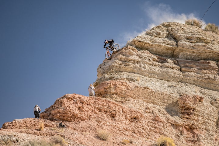 <p>When Rampage began, simply making it down the mountain without crashing was really the goal. Today navigating sections like this ridge, as Thomas Genon demonstrates, is simply a means of traversing from one jump or drop to another.</p>