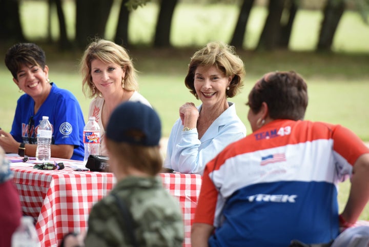 <p>Mrs. Bush speaking with family members and caregivers of veterans. </p>