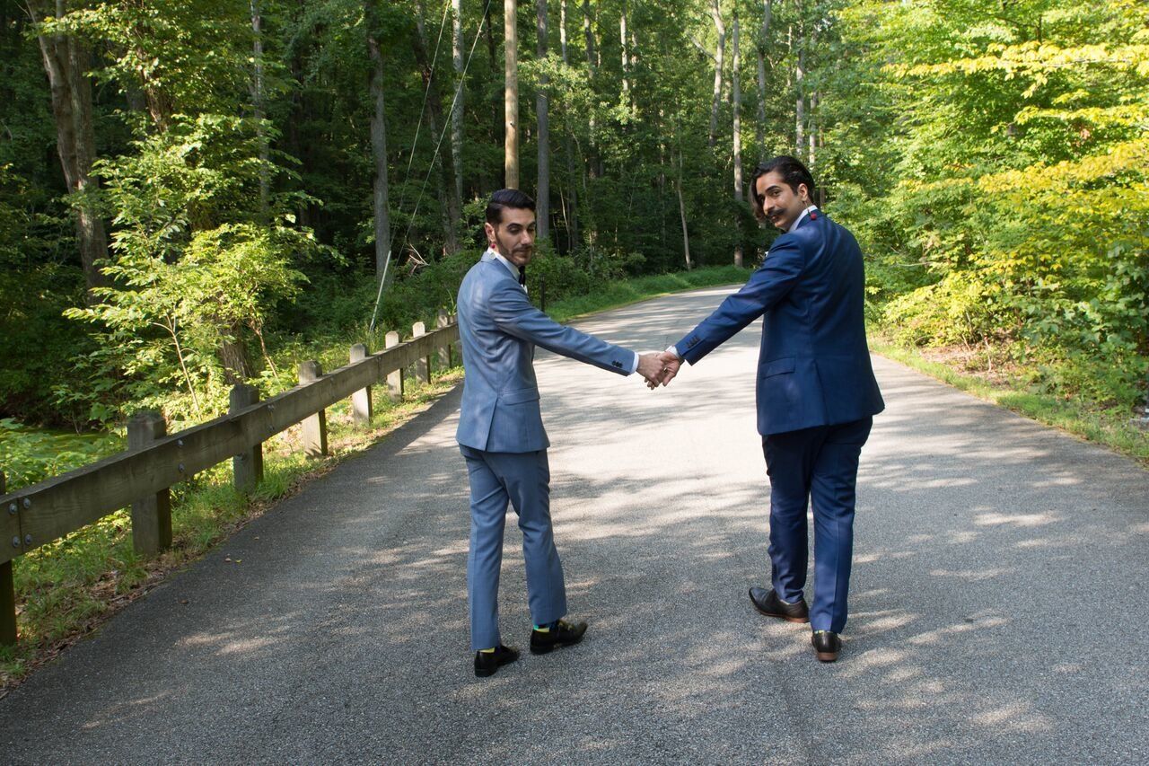 The newly wedded couple pose for a photo.