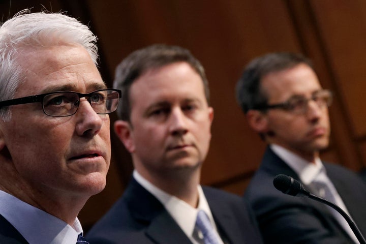 Colin Stretch, general counsel for Facebook; Sean Edgett, acting general counsel for Twitter; and Richard Salgado, director of law enforcement and information security at Google, testify on Capitol Hill on Oct. 31, 2017.