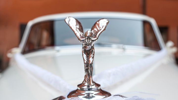 Spirit of Ecstasy of Rolls-Royce Phantom V. The Rolls-Royce Phantom V is a large, ultra-exclusive four-door saloon produced by Rolls-Royce Limited from 1959 to 1968.
