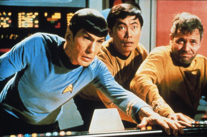 George (centre) with his 'Star Trek co-stars Leonard Nimoy (left) and William Shatner.