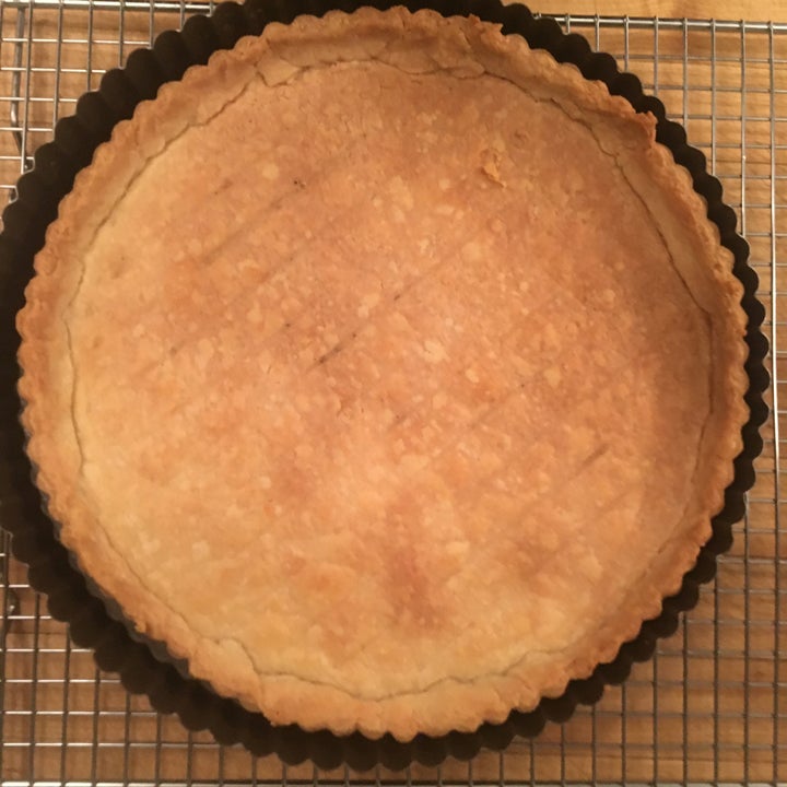 <p>Bake the empty tart shell completely before filling and re-baking</p>