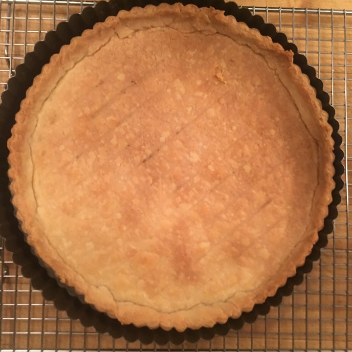 Bake the empty tart shell completely before filling and re-baking