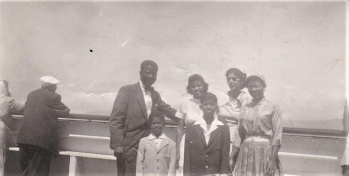 Smallwood (center) with family on the SS Constitution somewhere on the Atlantic, 1955.