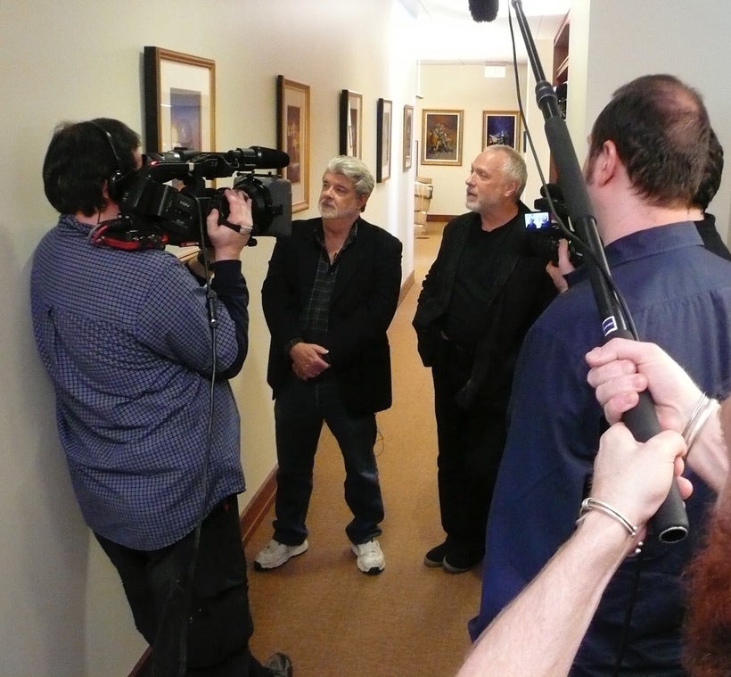 Drew and George Lucas during the filming of Drew: The Man Behind The Poster