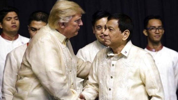 President Trump with Philippines President Rodrigo Duterte on Sunday. Duterte is widely accused of human rights abuses including murders while Trump has praised him and invited him to visit the Oval Office.