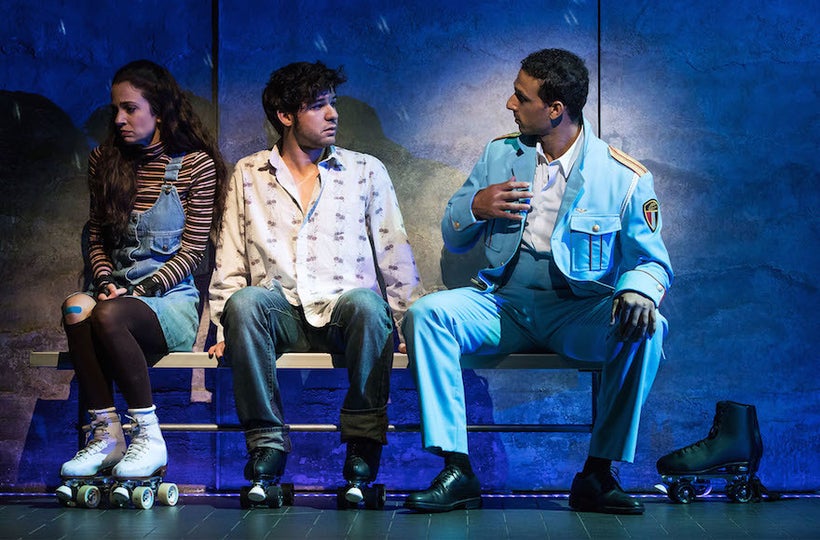 Ari’el Stachel, right, plays matchmaker to two shy Israelis, played by Rachel Prather and Etai Benson, in <em>The Band’s Visi