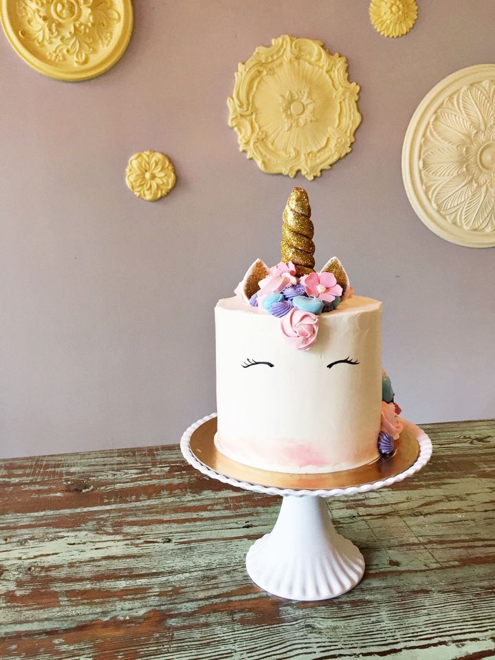 Whimsical unicorn cake courtesy of Buttercream Bakery.