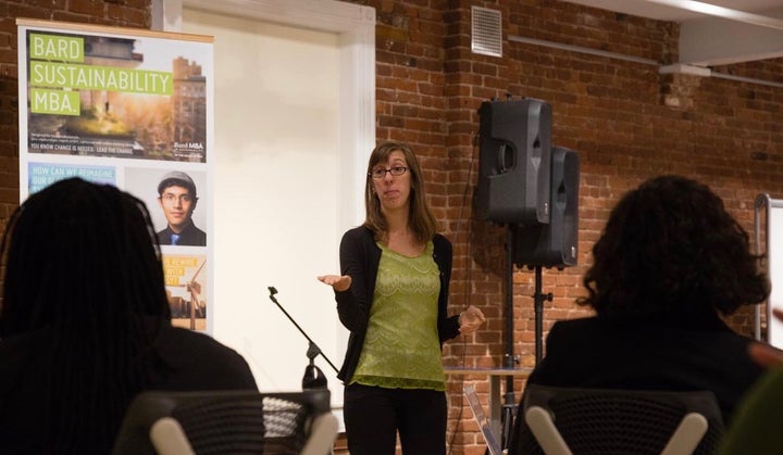 <p>Laura Gitman with students</p>
