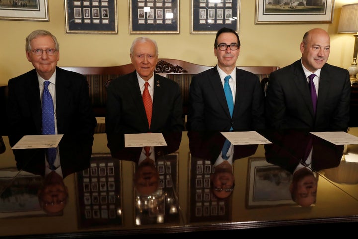 (L-R) Senate Majority Leader Mitch McConnell, Sen. Orrin Hatch, Treasury Secretary Steve Mnuchin and Director of the National Economic Council Gary Cohn introduce the Republican tax reform plan at the U.S. Capitol in Washington,