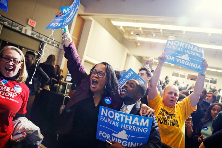 Supporters of Democratic gubernatorial candidate Ralph Northam celebrate as results start to come in at Northam's election night rally on the campus of George Mason University in Fairfax, Virginia, on Nov. 7. 