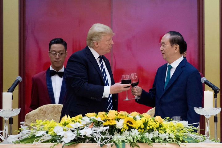 Vietnamese President Tran Dai Quang toasts President Donald Trump during a state dinner in Hanoi on Nov. 11, 2017.