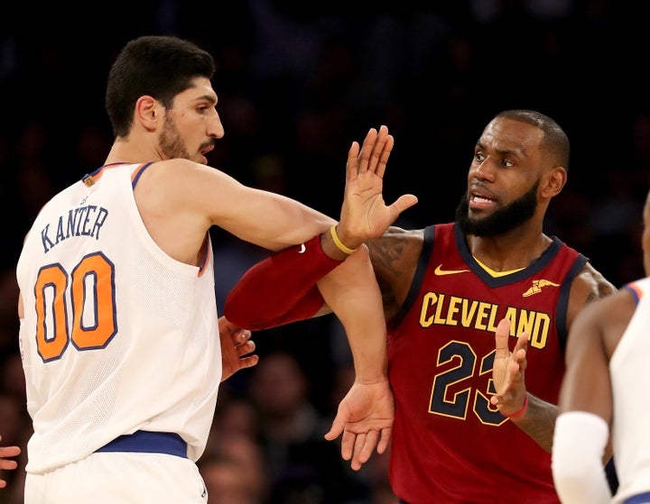 Enes Kanter and LeBron James fight for position during the Cleveland Cavaliers' 104-101 victory.