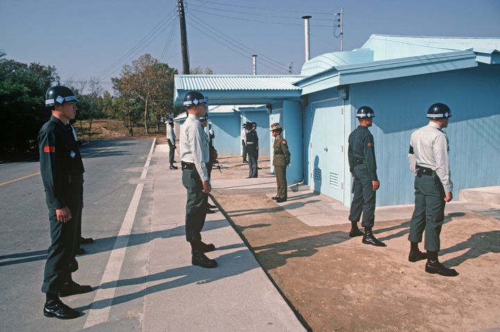 South Koreans and American soldiers at Panmunjom, the Korean demilitarised zone 