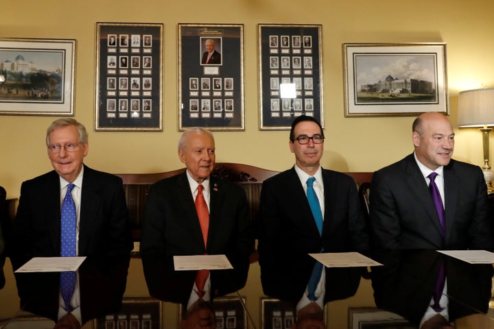 Senate Majority Leader Mitch McConnell, Sen. Orrin Hatch, Treasury Secretary Steve Mnuchin and National Economic Council Director Gary Cohn introduce the Republican tax reform plan at the Capitol on Nov. 9. 