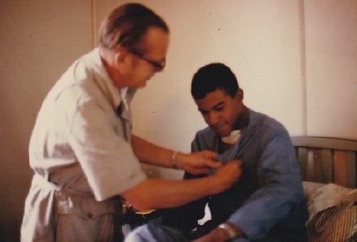 Being awarded the Combat Infantry Badge in 3rd Field Hospital after being wounded, Saigon, 1969.