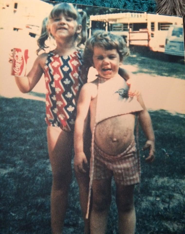 Check out my 'ol pal Becky and her dirty belly back in our trailer park days! Beck had just learned to wink that week. Sh