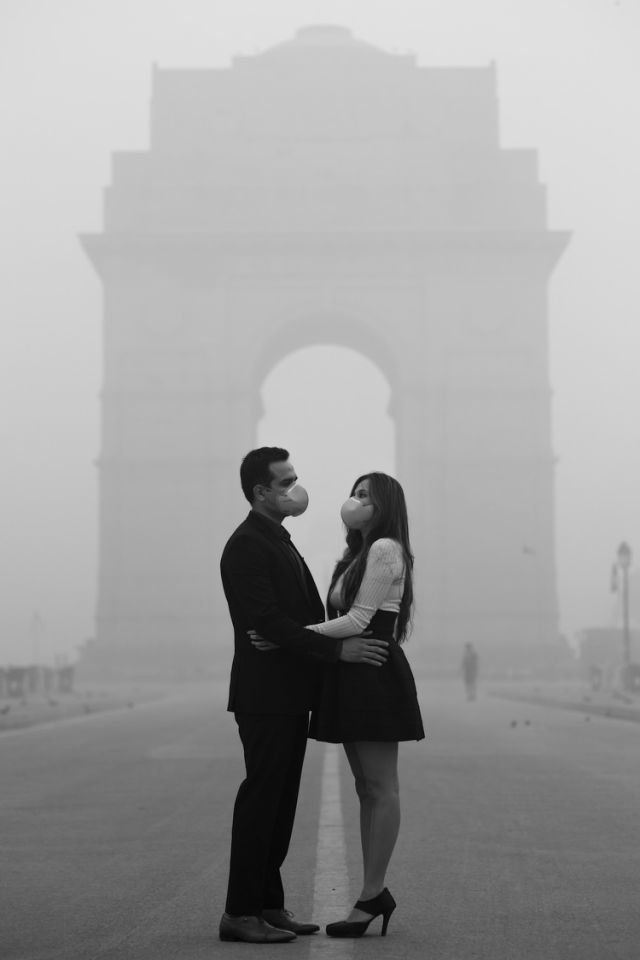 The couple posed for the engagement photos in smog-filled New Delhi.