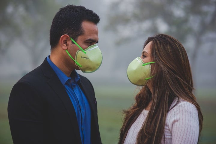 Face masks helped the couple breathe better in the polluted New Delhi air.