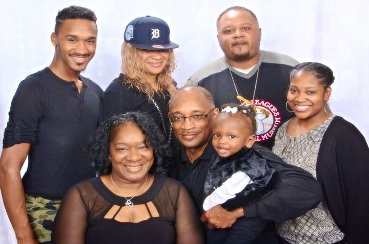 The Hill Family: Standing left to right: Alex II, Alexis, Felix and Krystal — Seated left to right: Phillis (mother), Alex Sr. (father), and Nala Lanae