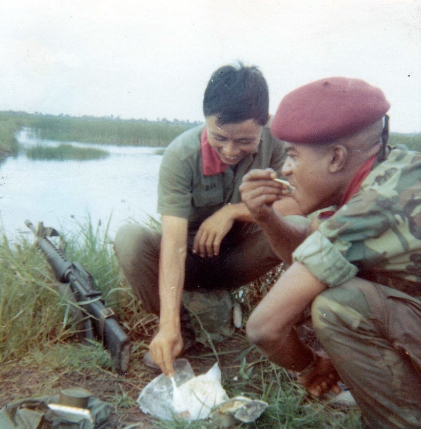 Breaking for lunch on the Mekong Delta, 1969.