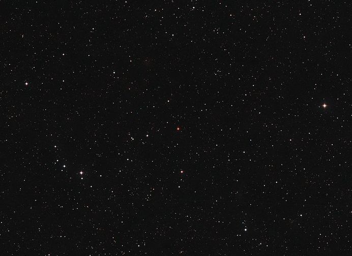 This image shows the sky around the red dwarf star Ross 128 in the constellation of Virgo (The Virgin). It was created from images forming part of the Digitized Sky Survey 2. Ross 128 appears at the centre of the picture.