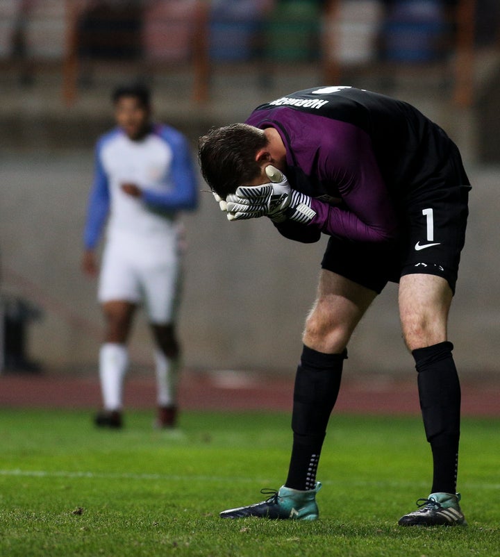 Ethan Horvath buries his face in his hands after allowing an easy goal.