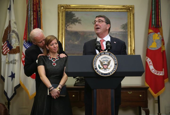 Vice President Biden stood close behind the wife of Defense Secretary Ash Carter at Carter's swearing-in ceremony in 2015.