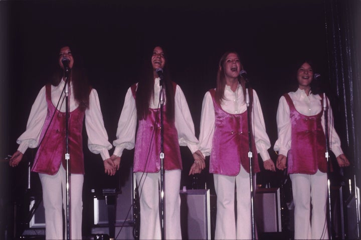 <p>Debby Boone is second from right, performing in concert with her sisters Cherry, Lindy and Laury in 1971 as The Boone Girls.</p>