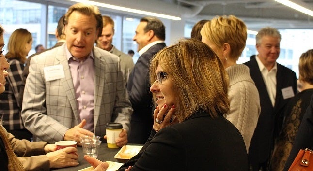 <p>Chicago 2.0 attendees chat just before the event kicks off.</p>