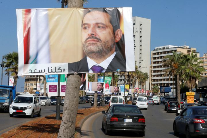 Posters of Lebanese Prime Minister Saad al-Hariri line the streets in Beirut. Many in Lebanon remain suspicious of his resignation announcement.