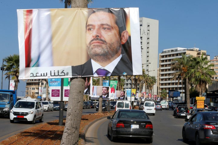 Posters of Lebanese Prime Minister Saad al-Hariri line the streets in Beirut. Many in Lebanon remain suspicious of his r