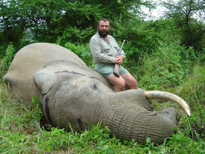Trophy hunting "can benefit the conservation of certain species," according to the U.S. Fish and Wildlife Service statement. Here, trophy hunter David Barrett with one of his kills in 2009 in Zimbabwe.