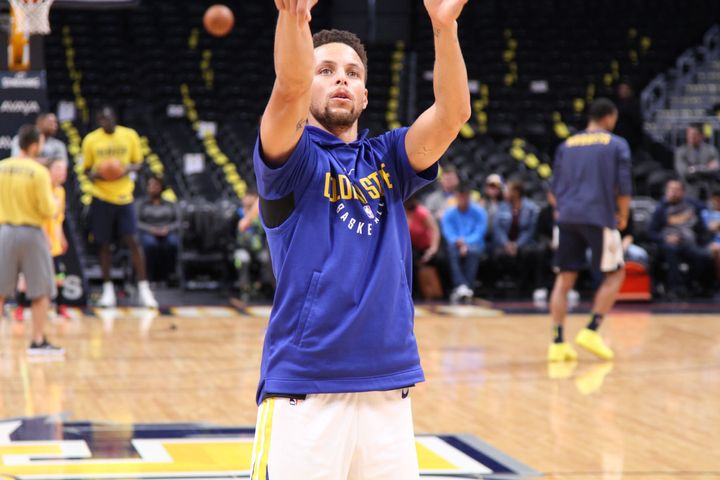 <p>Stephen Curry with the perfect follow through during pregame warmups.</p>