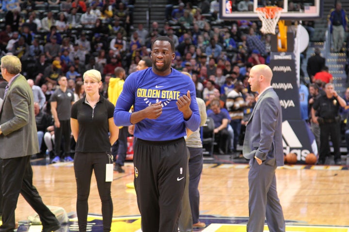 Draymond Green gets ready during pregame warmups.